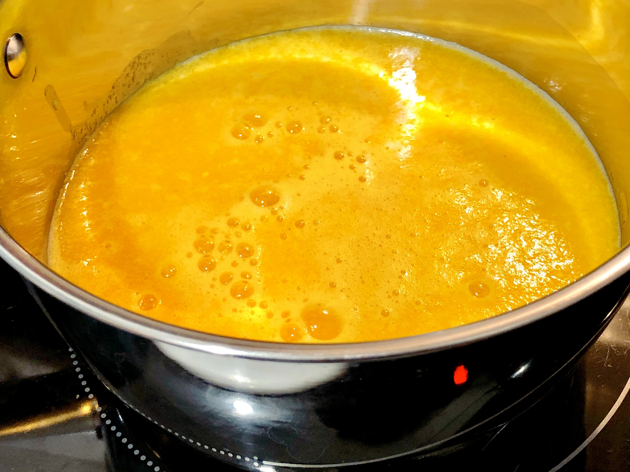 orange mash in kettle, scotch bonnet