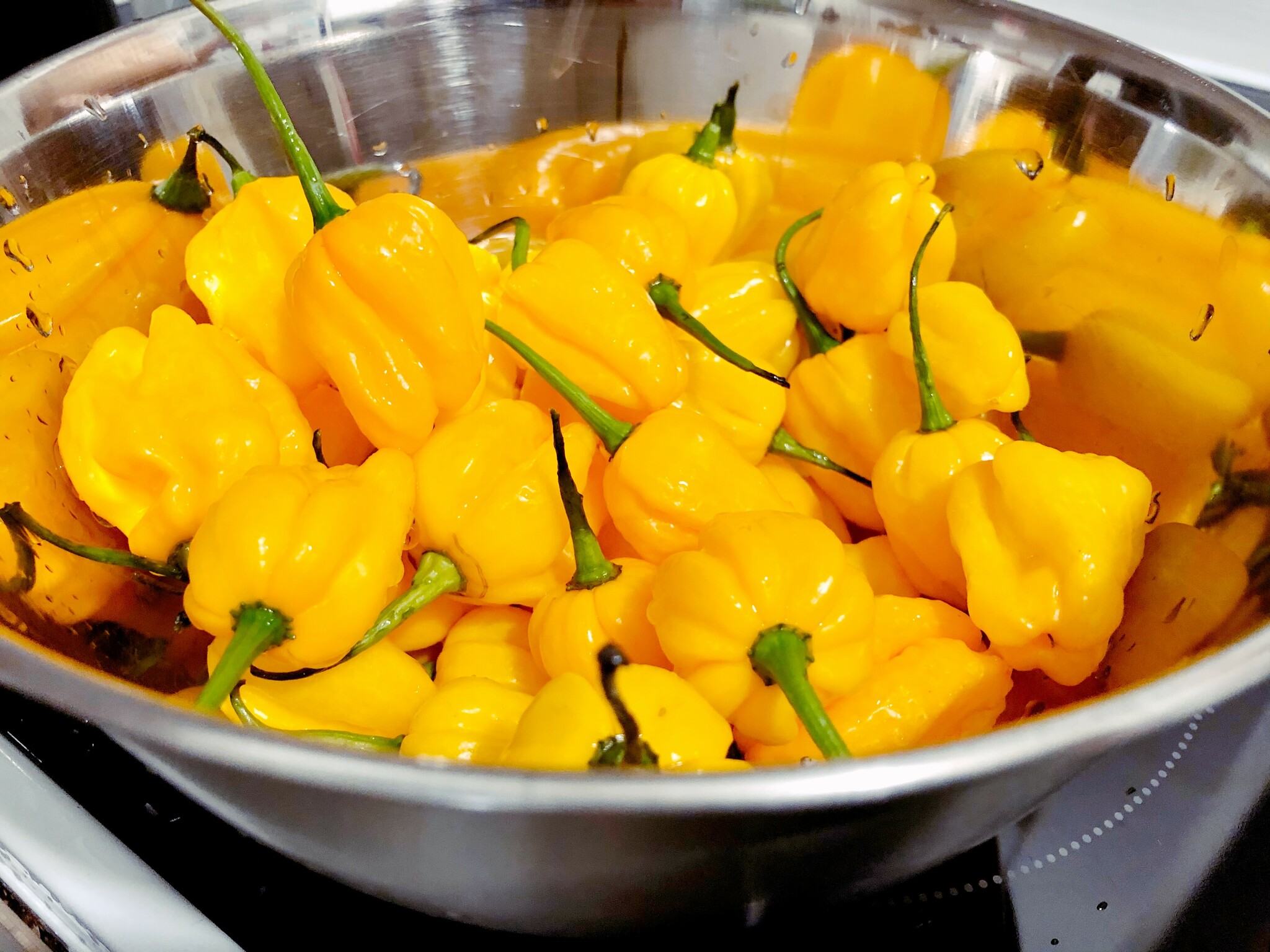 washed scotch bonnets in a bowl